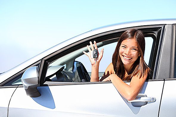 Young Girl with keys to a car