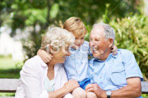Photo of happy grandparents with grandchild