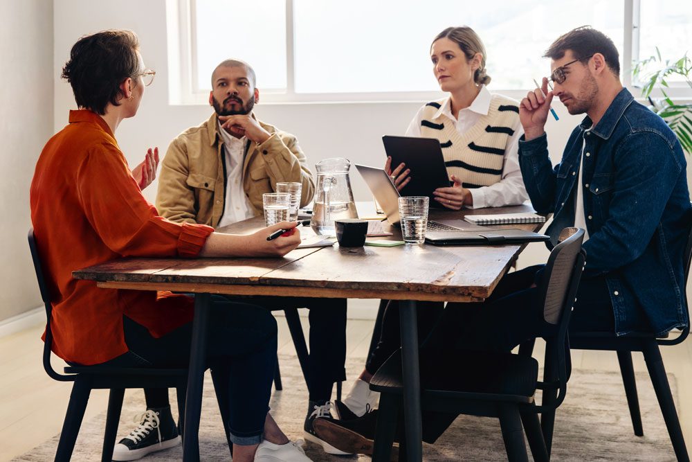 A team having a discussion around a table