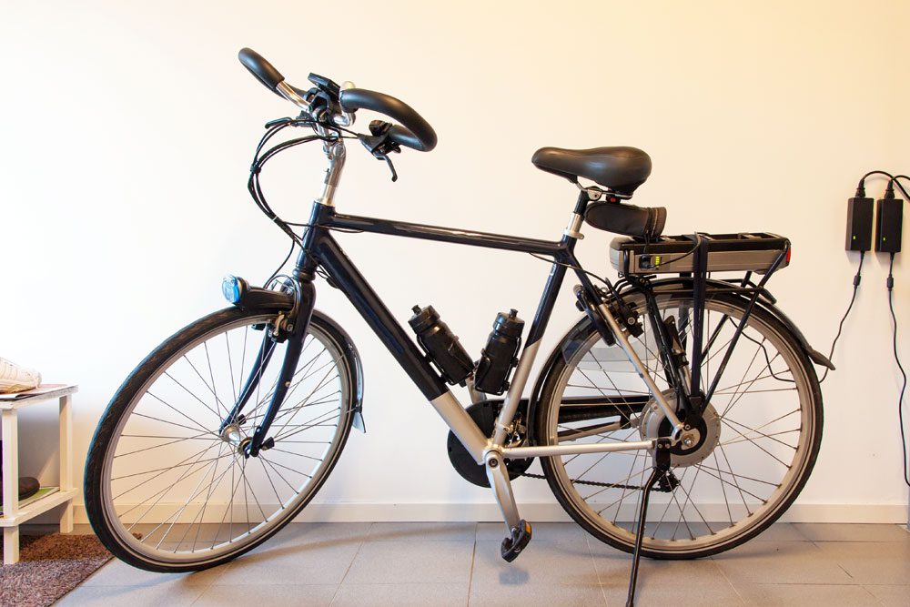 Photo of an electric bike charging its lithium ion battery