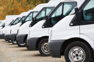 Photo of a row of commercial work vans