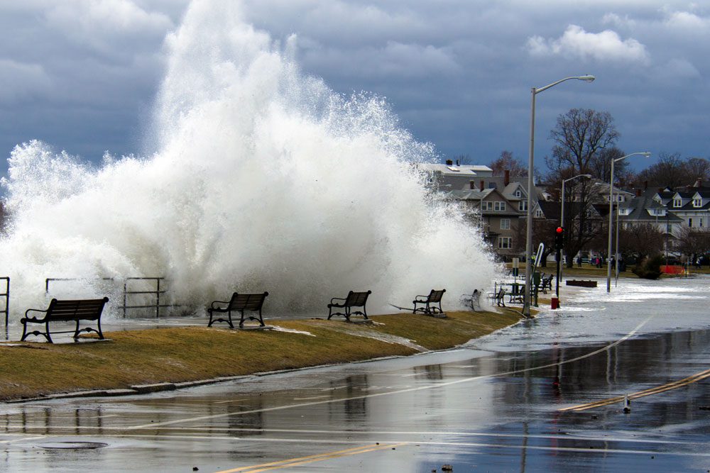 Photo of huge wave of water in city park